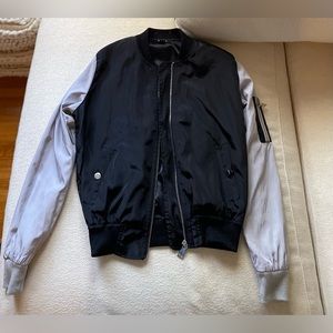 Black and gray bomber jacket